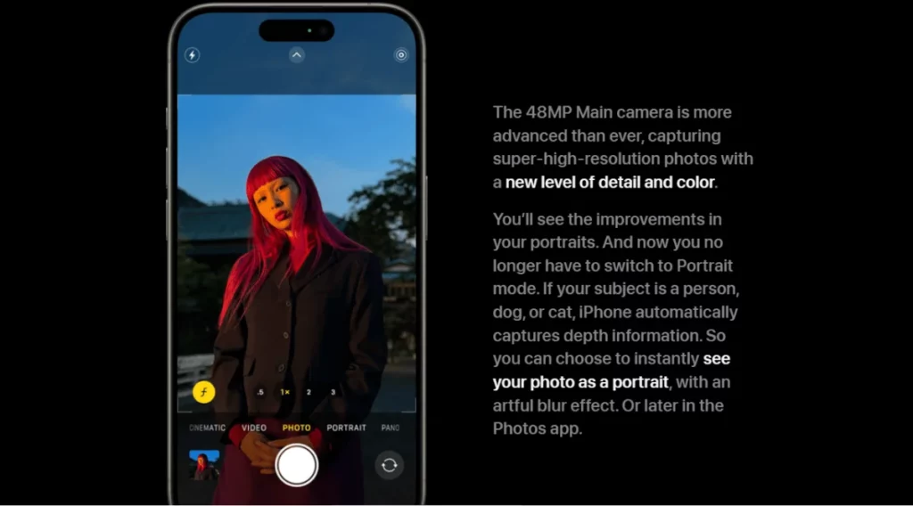 The iPhone is displaying an image of a person with red hair.